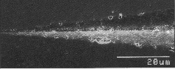 SEM closeup of Knoop indentation tip.